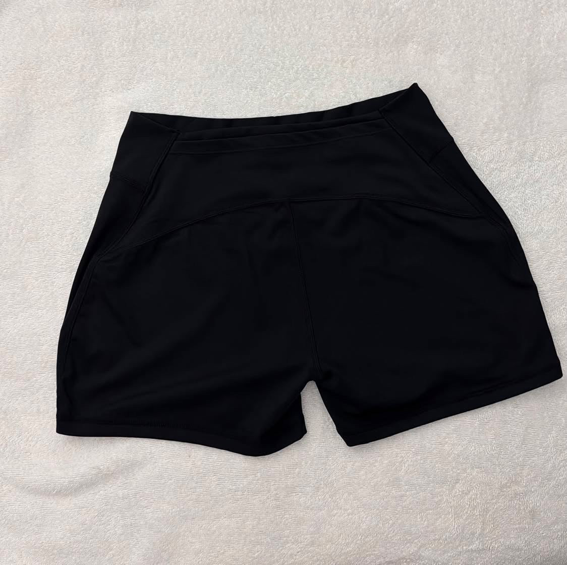 Black Pressure Short product view showing the sculpting performance fit